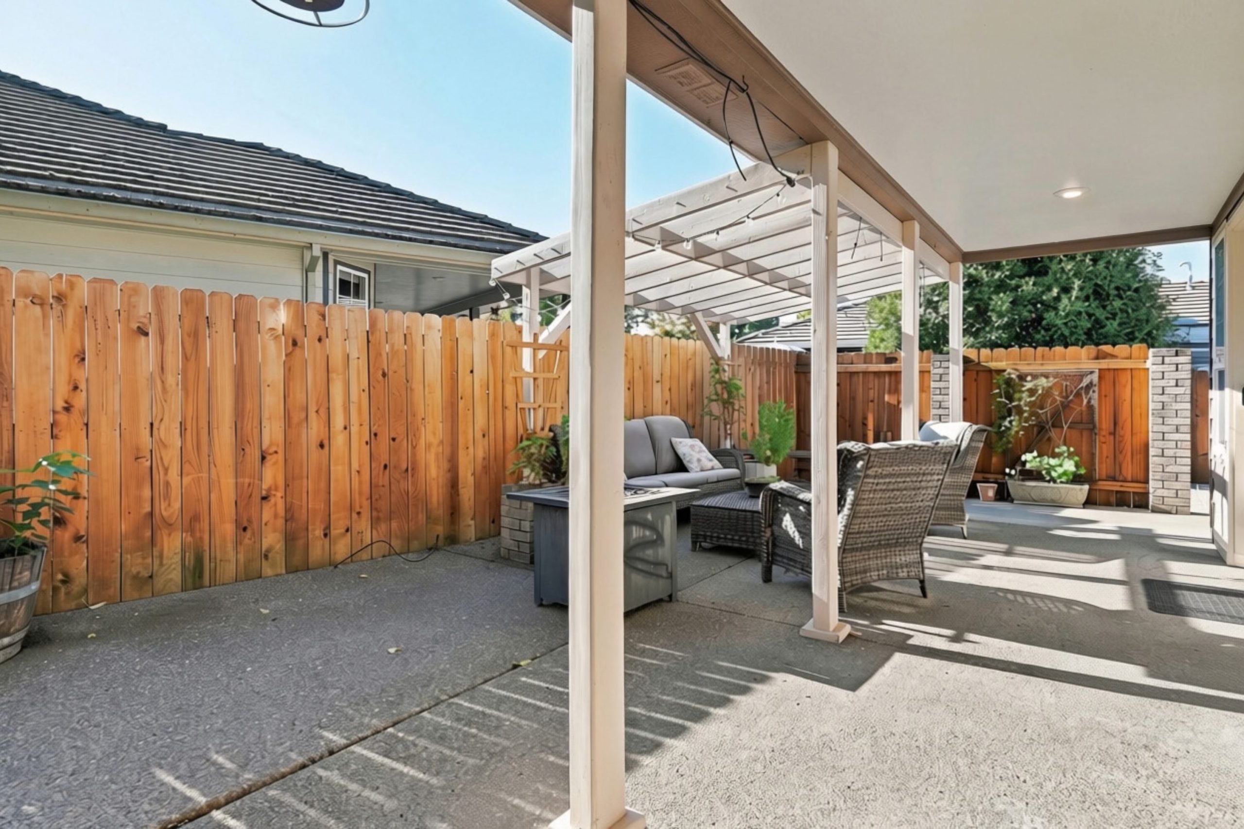 Fenced backyard and covered patio at 947 Brandon Street