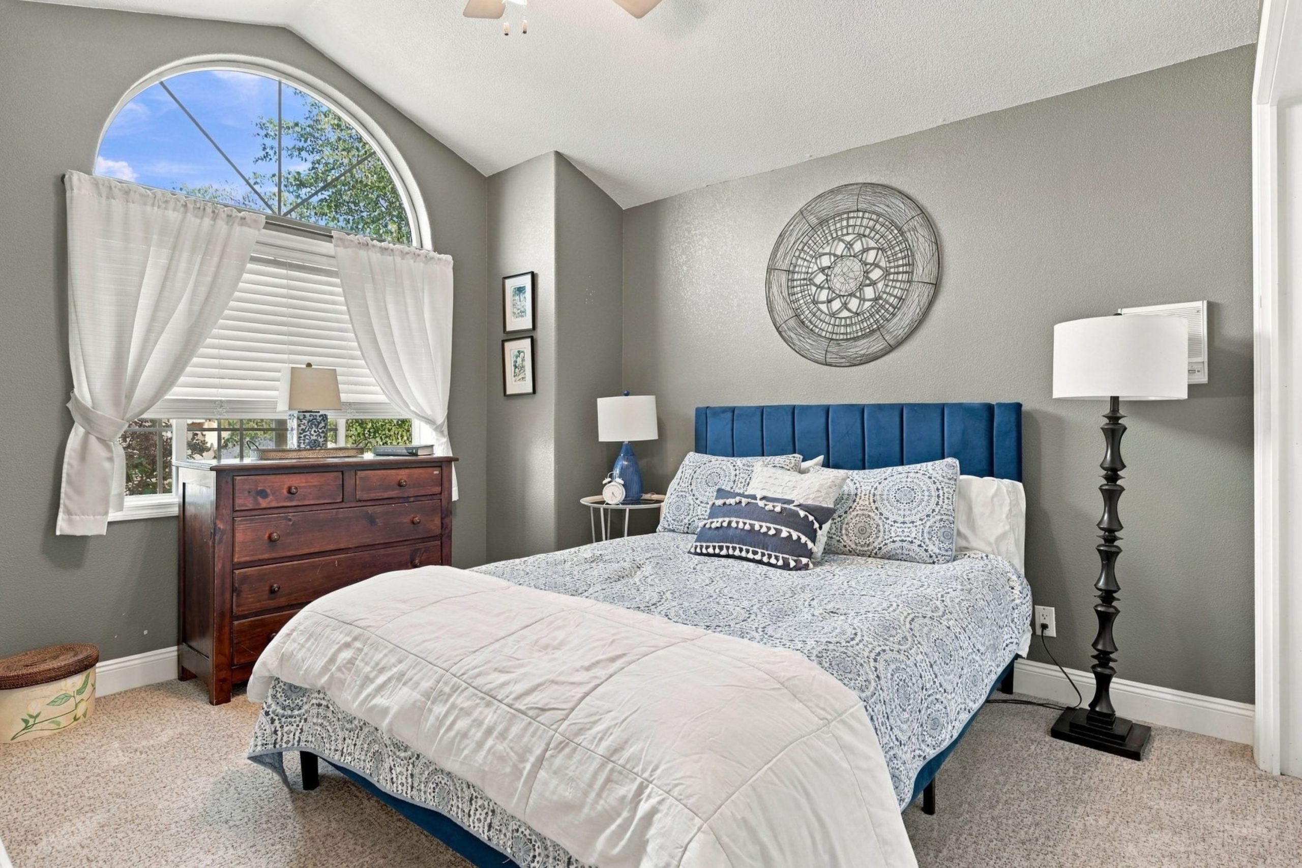 Bedroom with arched window at 947 Brandon Street