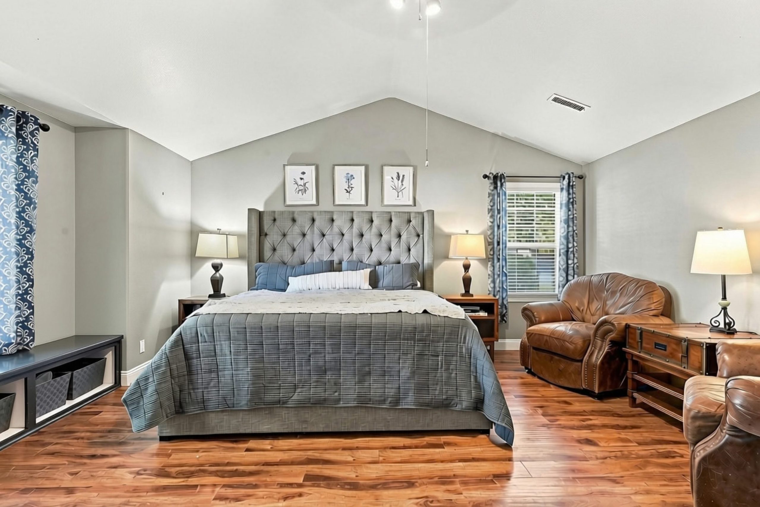 Primary bedroom with vaulted ceiling at 947 Brandon Street