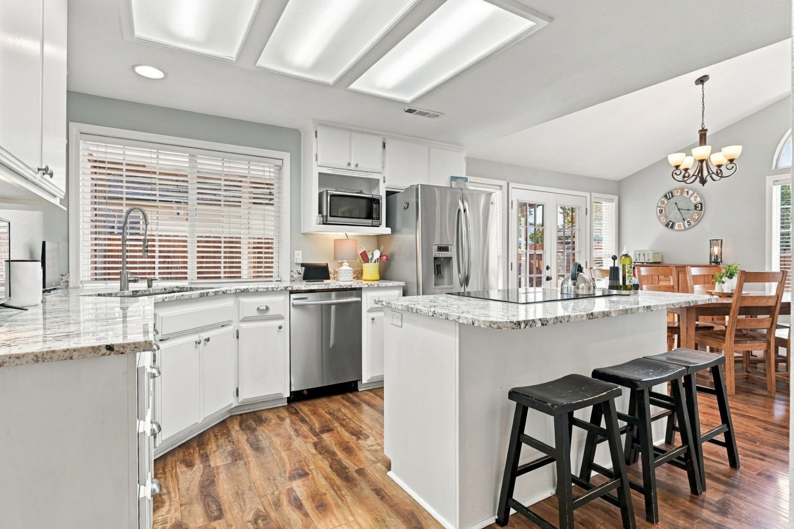 Renovated kitchen with granite counters and island at 947 Brandon Street Central Point