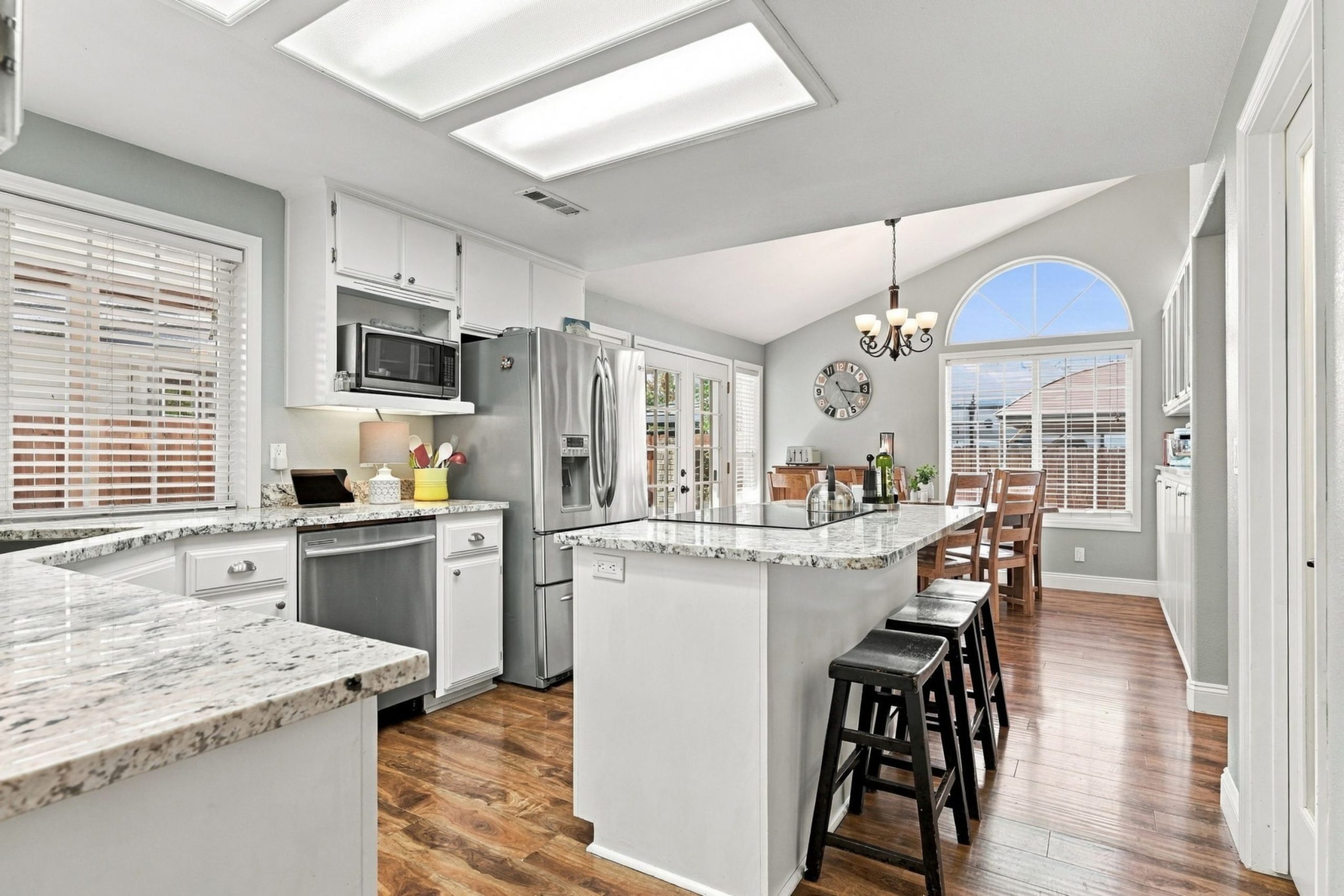 Kitchen with skylight and island seating at 947 Brandon Street