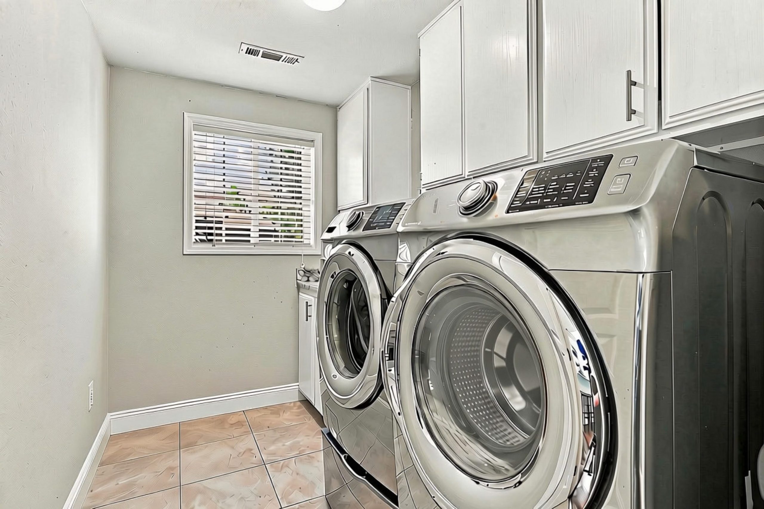 Laundry room with front-load washer and dryer at 947 Brandon Street
