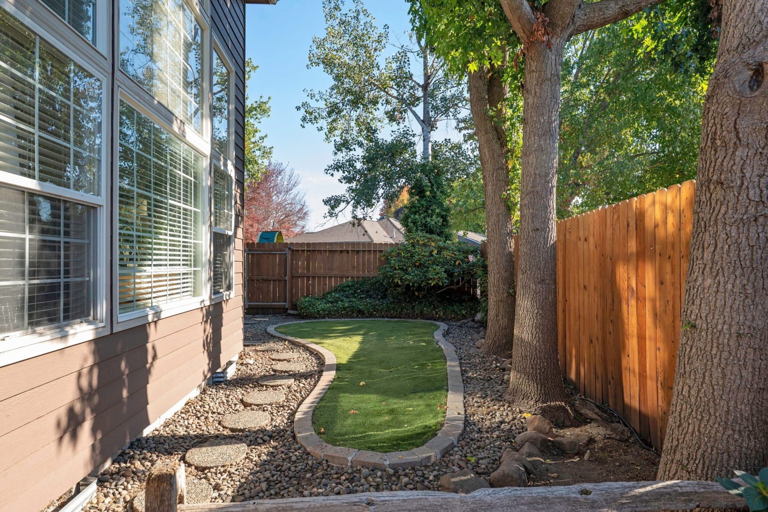 Side yard with fence and landscaping at 947 Brandon Street